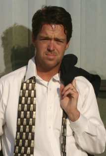 Актер Дэвид Е. Браун