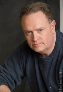 Актер Том Грир