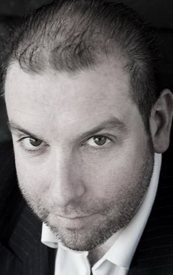 Актер Эд Гуган