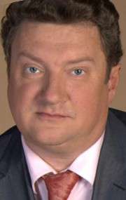 Актер Олег Комаров