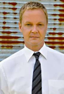 Актер Майкл Дж. Бёрг