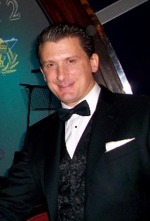 Актер Грег Канестрари