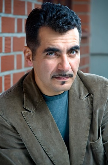 Актер Олег Хилл