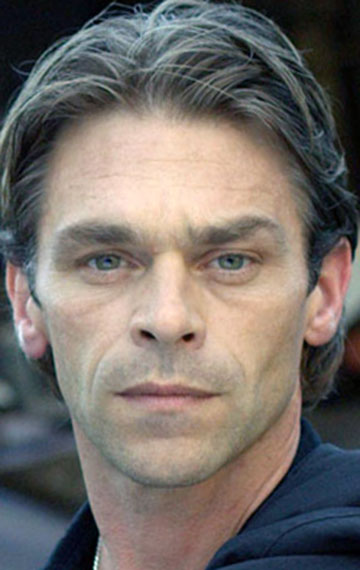 Актер Иэн Трейси