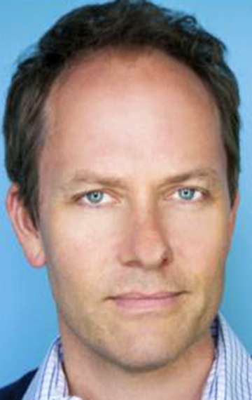 Актер Том Барнетт