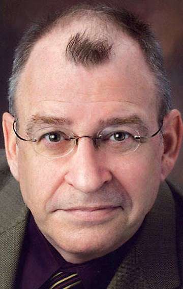 Актер Дэвид Брисбин