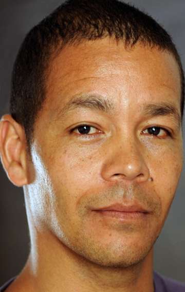 Актер Ллойд Адамс