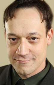 Актер Тед Рэйми