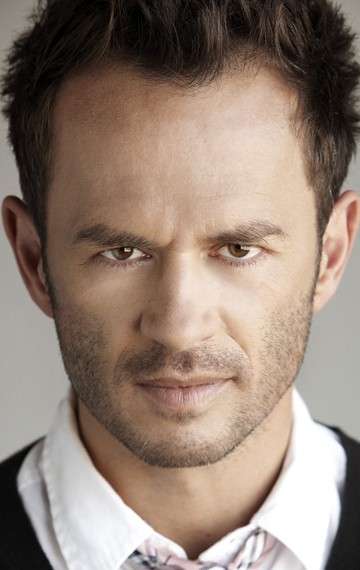 Актер Грег Эллис