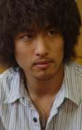 Актер Хироёси Комуро