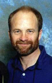 Актер Эдриан Роулинз