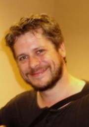 Актер Дэн Грин