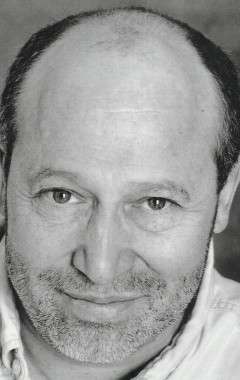 Актер Сэм Стоун