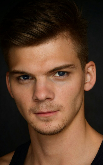 Актер Александр Люман