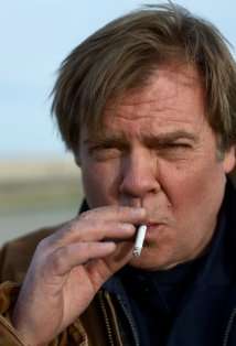 Актер Грег Лосон