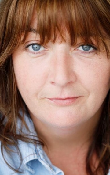 Актер Эшли МакГуайр